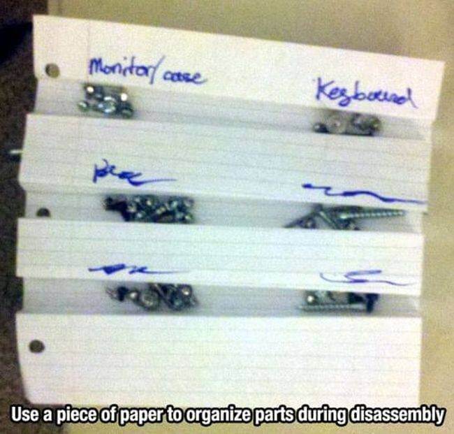 Fold a piece of paper to organize screws
