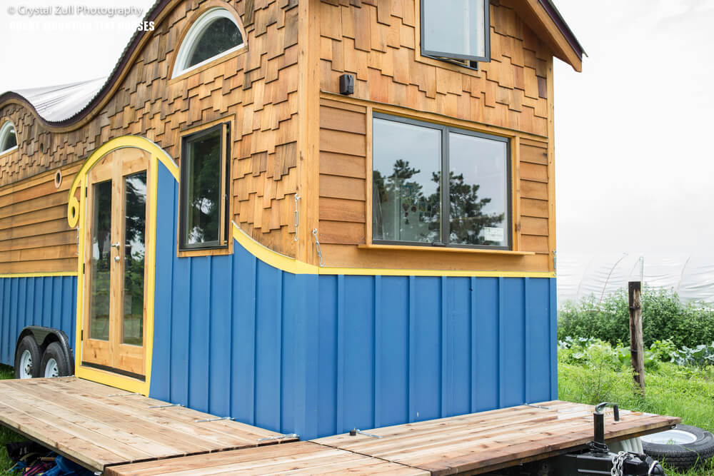 The Pequod tiny home even has a deck outside