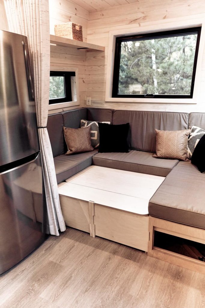 The Draper's U-shaped sofa, with the table in a lowered position