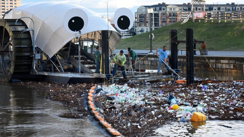 Mr. Trash Wheel cleaning up the trash from the harbor