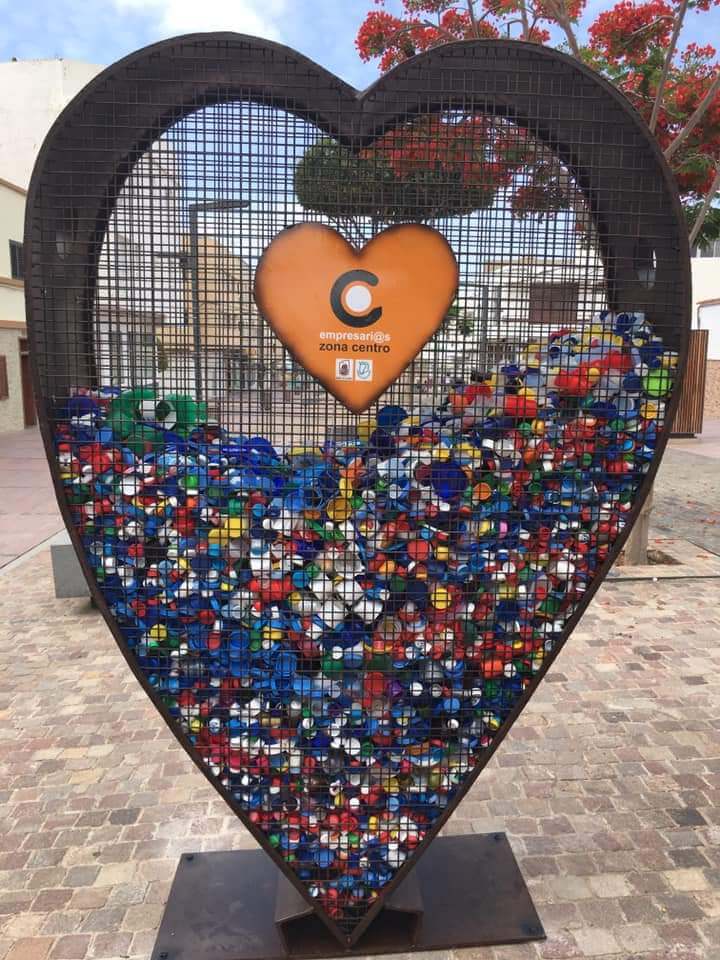 Heart shaped beach cleanup sculpture