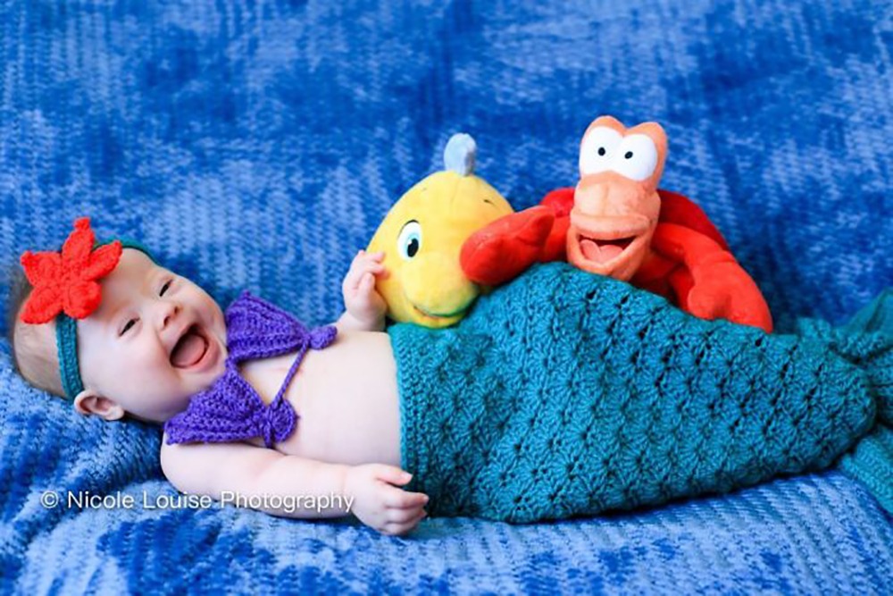 children with Down Syndrome posing as Disney characters for an awareness campaign 