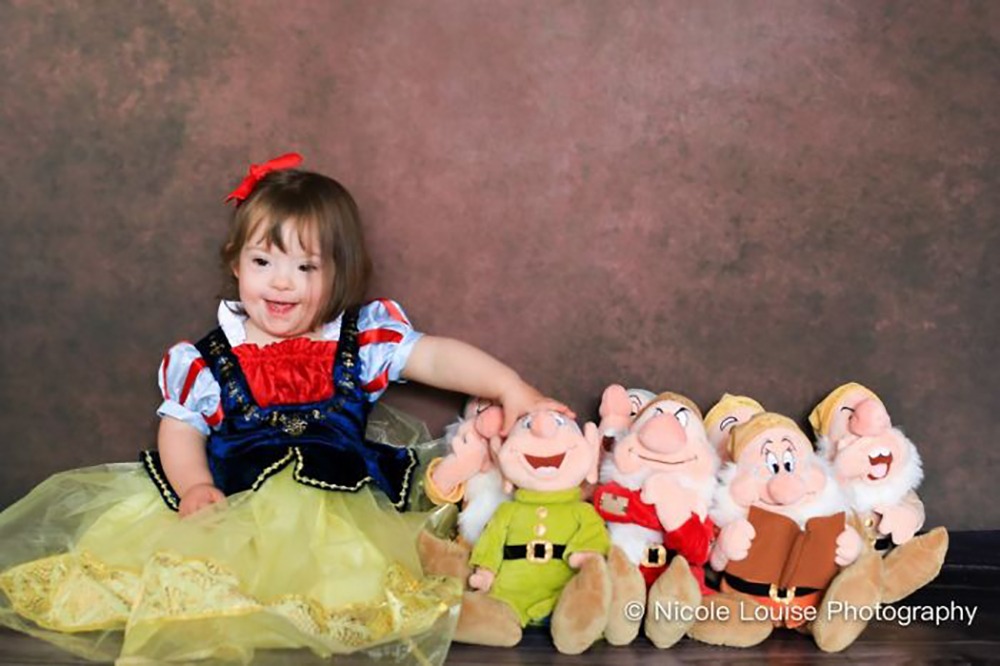 children with Down Syndrome posing as Disney characters for an awareness campaign 