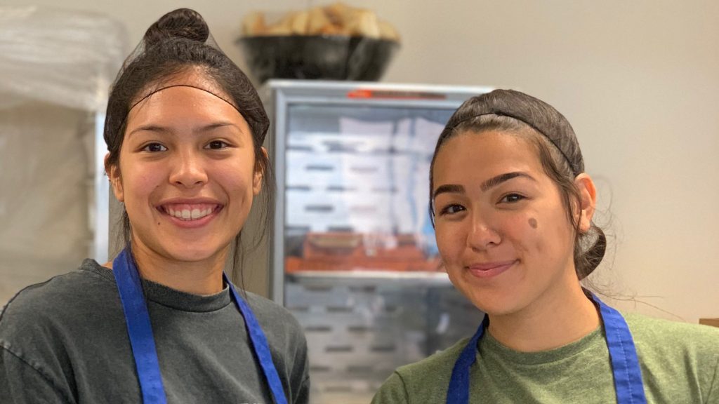 Leanne Carrasco, right, and a friend at the Star of Hope Family Development Center in Houston