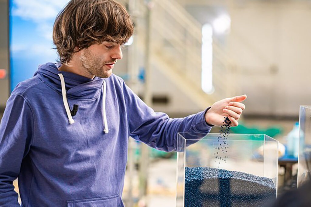 The Ocean Cleanup CEO and founder Boyan Slat with the team's recycled plastic.