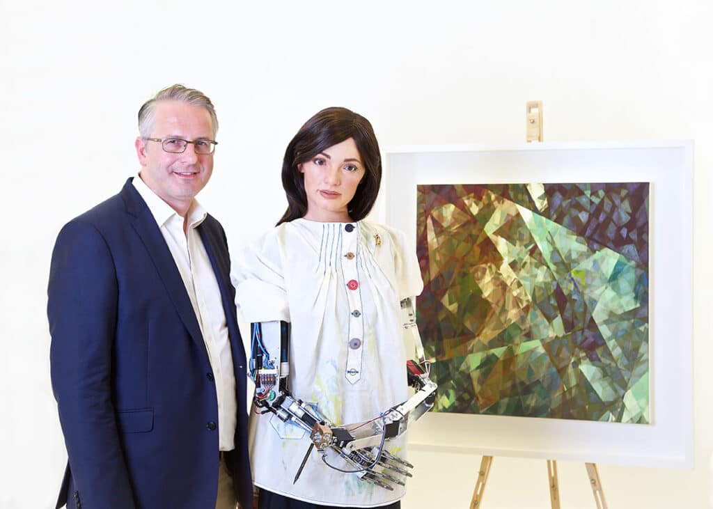 World’s First Robot Artist To Exhibit Self-Portraits This Summer