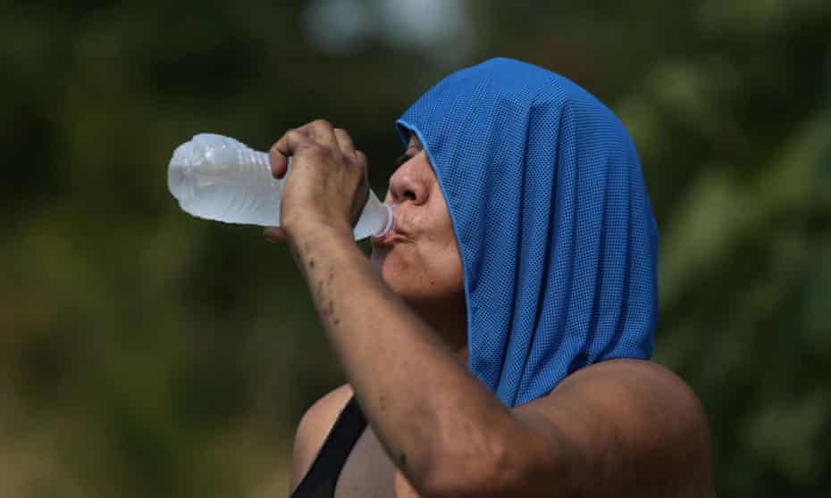 A person drinking water to stay hydrated during the heatwave that struck Salem, Oregon on 12 August 12, 2021