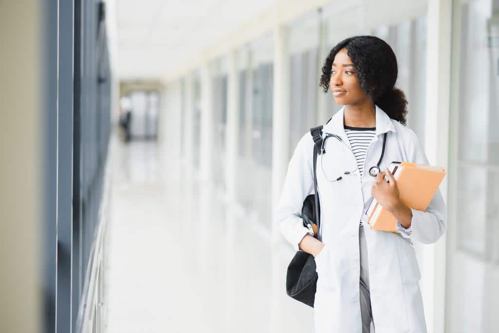 family nurse practitioner student walking through hall