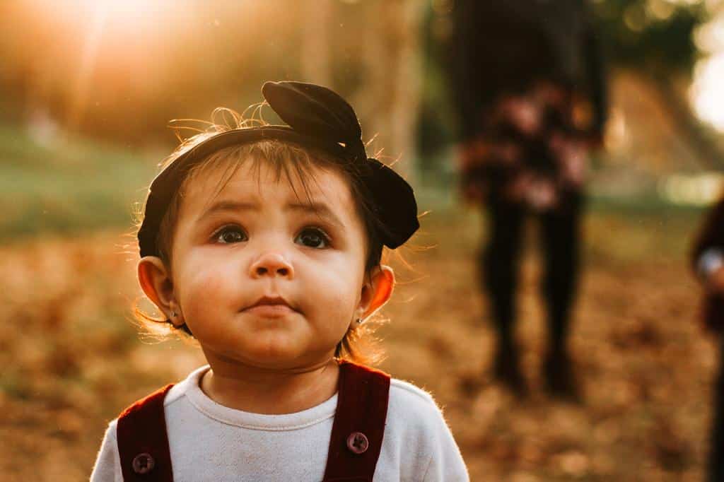 toddler girl wearing layered cothing