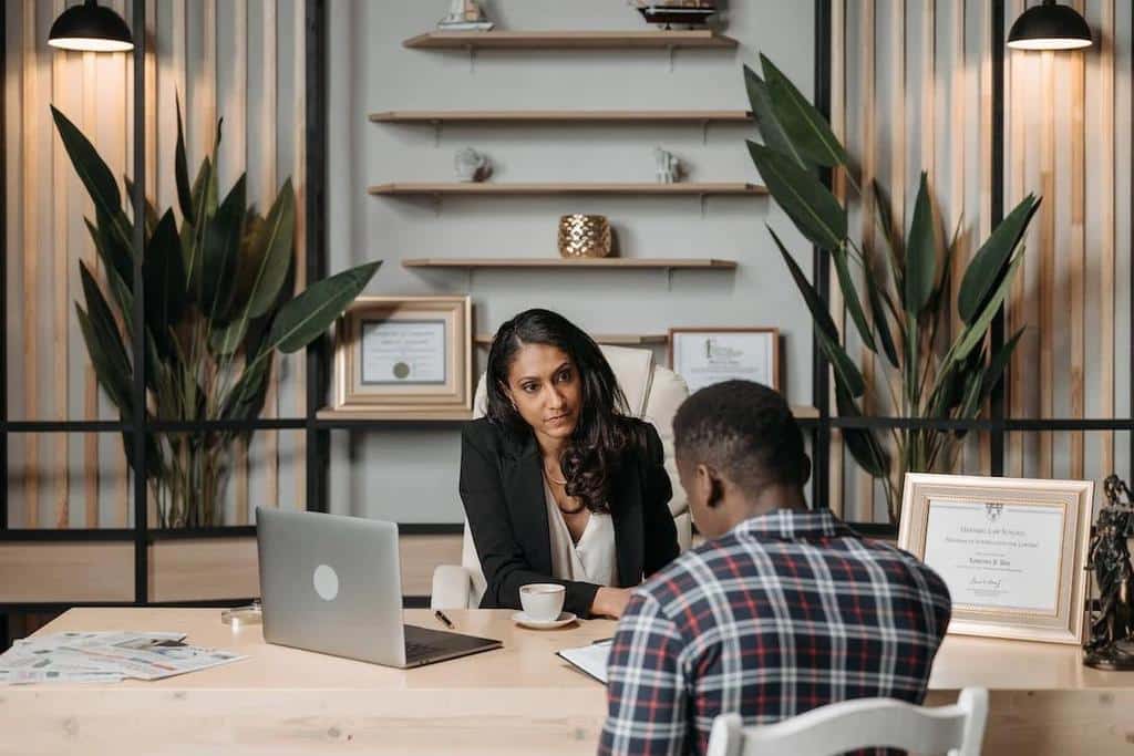 two persons having a legal meeting