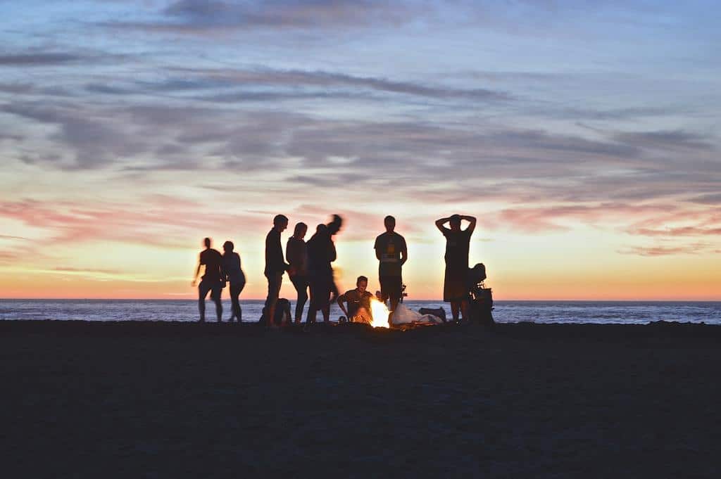 silhouettes of people in a field