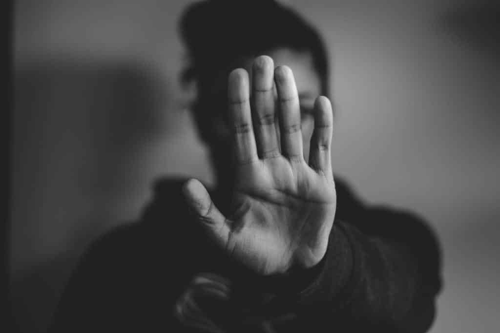 person holding palm up to camera