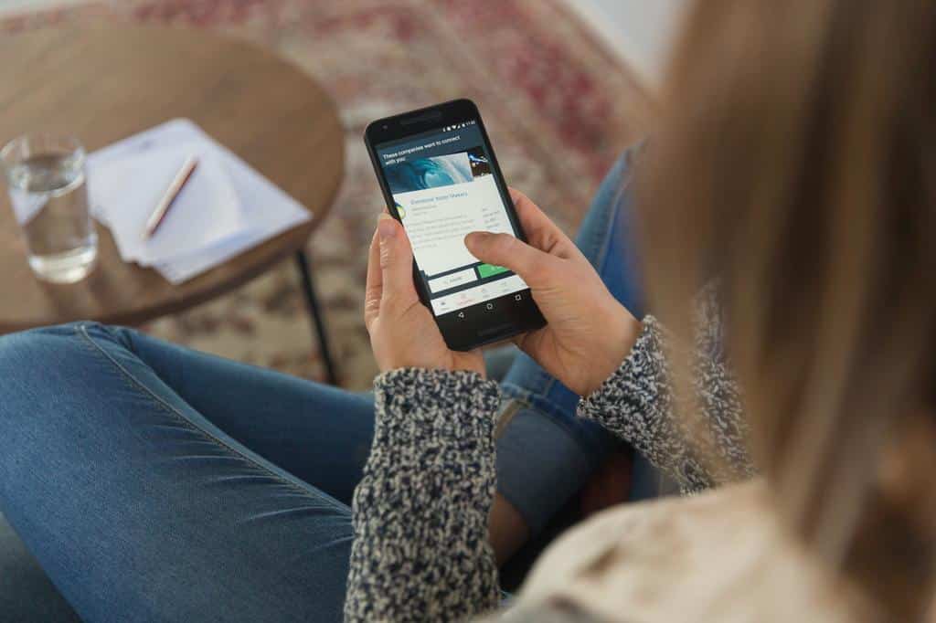 woman using smartphone