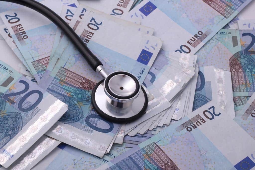 stethoscope on top of money