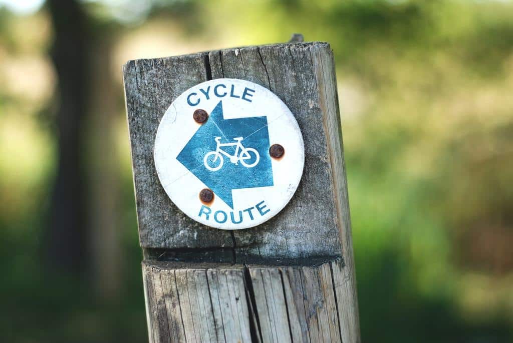 sign pointing out a bike route