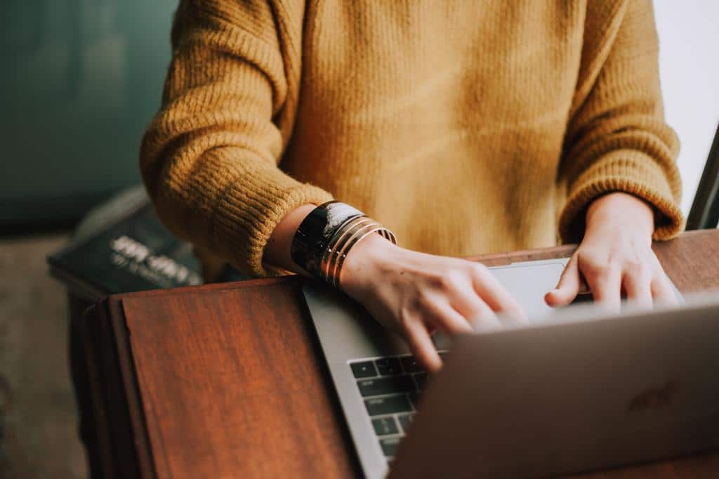 person doing work on laptop