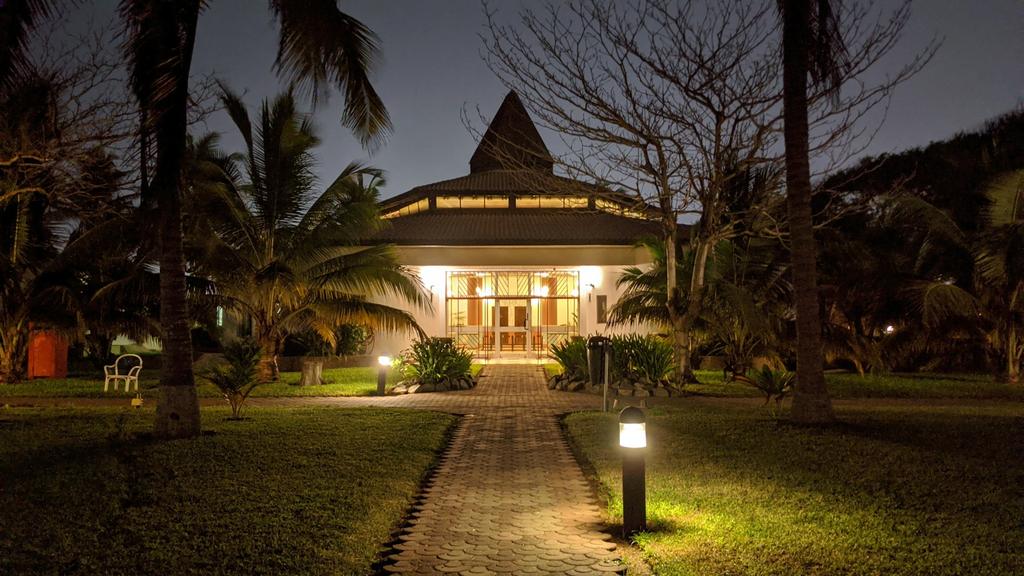 beautiful home with outdoor lights along walkway