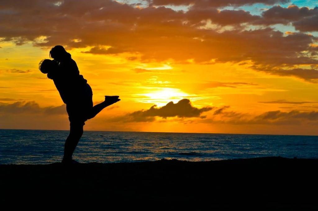 sunset silhouette romantic couple