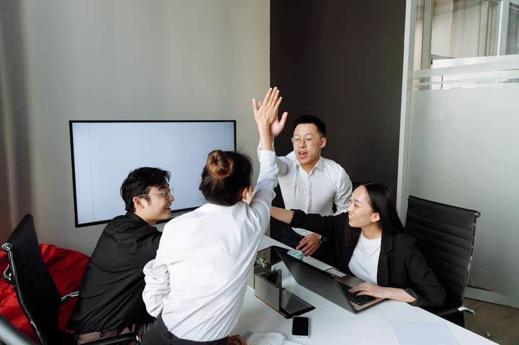 group of people celebrating business success