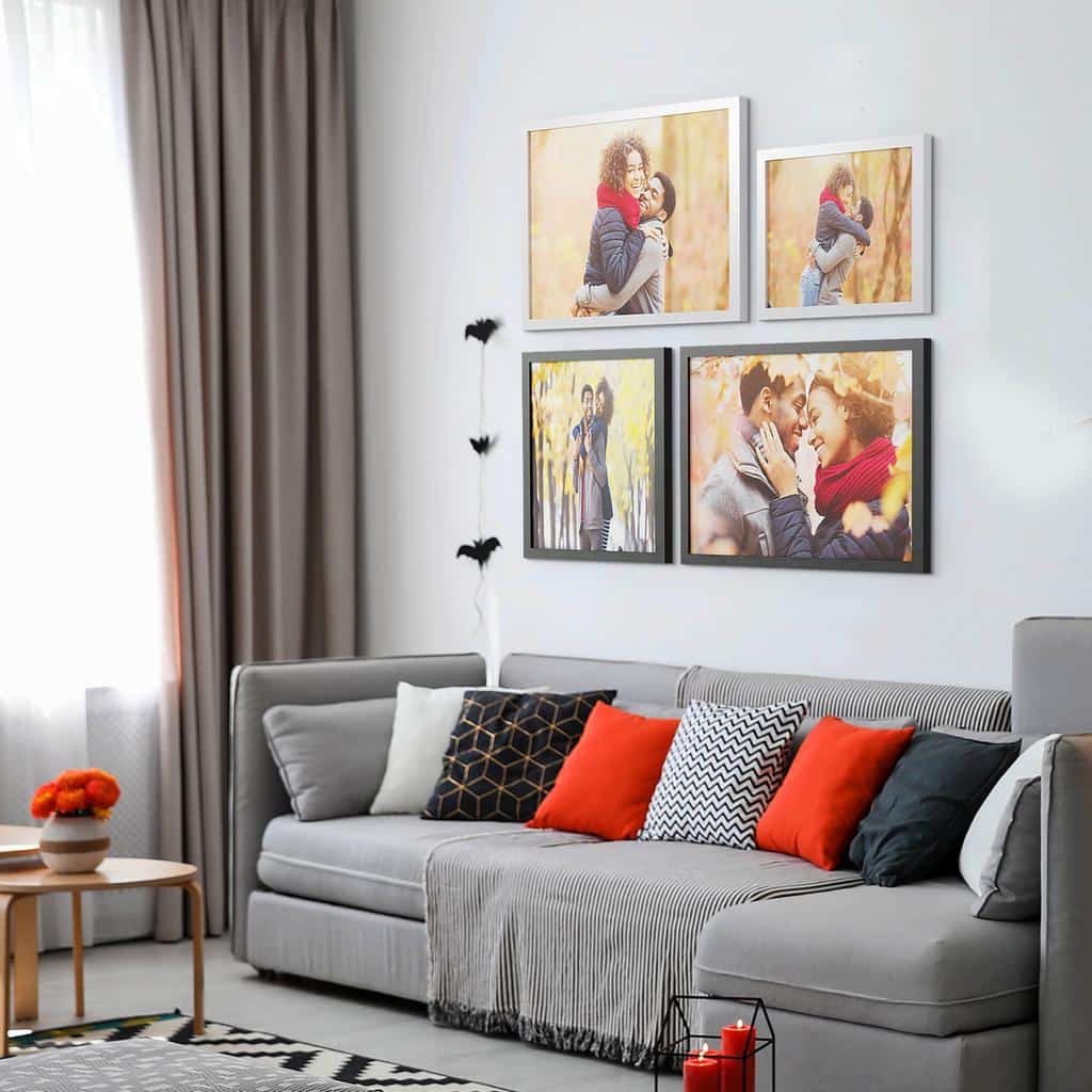 Your home's overall style can help you decide between canvas prints and framed photos.