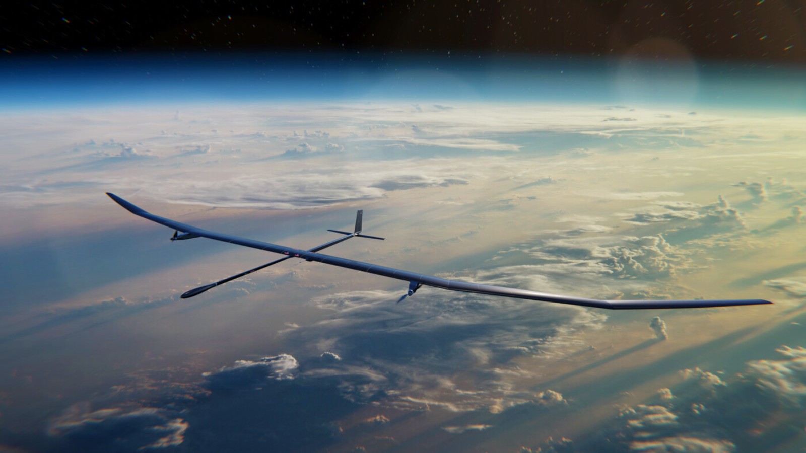 The PHASA-35 solar-powered high-altitude pseudo-satellite drone in flight above the clouds on its 35-metre carbon composite wings