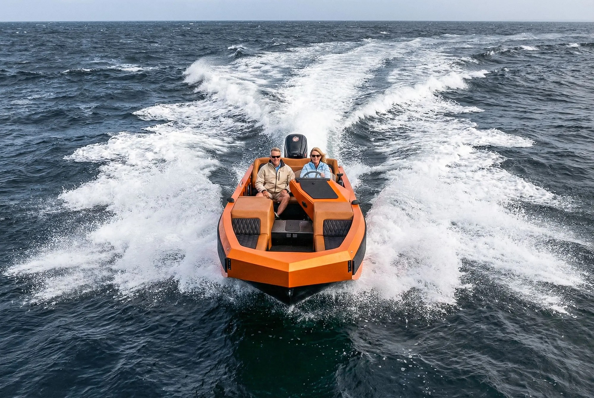 WaterCar EV: The Electric Road Car That Doubles as a 35 MPH Speedboat A WaterCar amphibious vehicle, which drives on roads and floats as a boat, pictured in orange on the water.